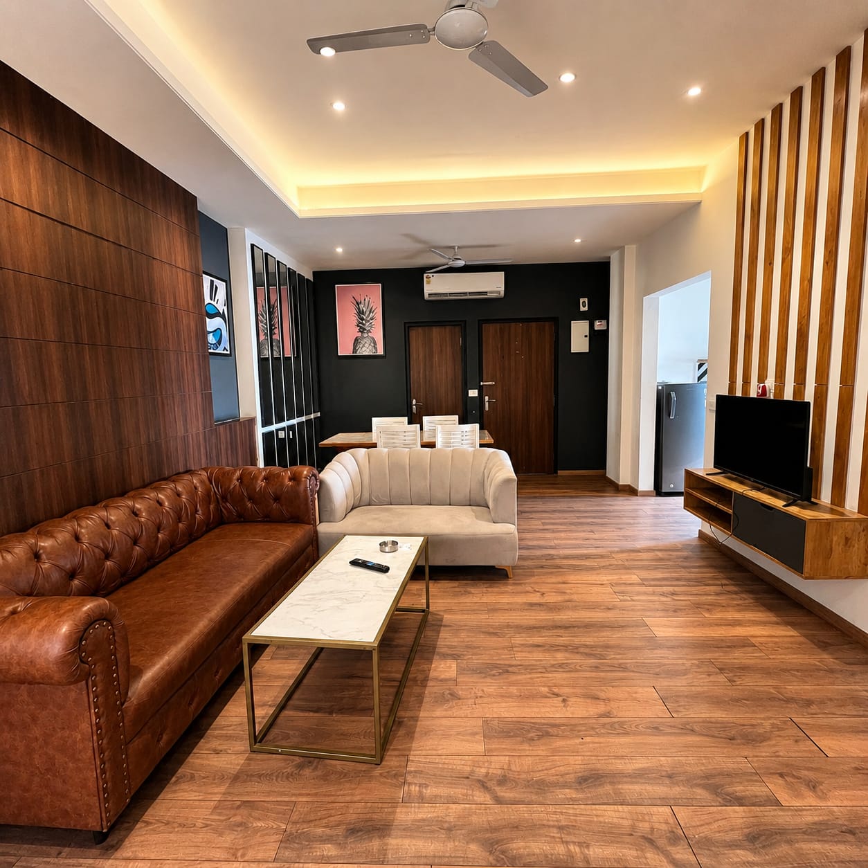Immaculate serviced 2BHK apartment in Jaipur with hotel-grade linens, a fully equipped kitchen, and elegant neutral interiors with subtle Rajasthani craft accents